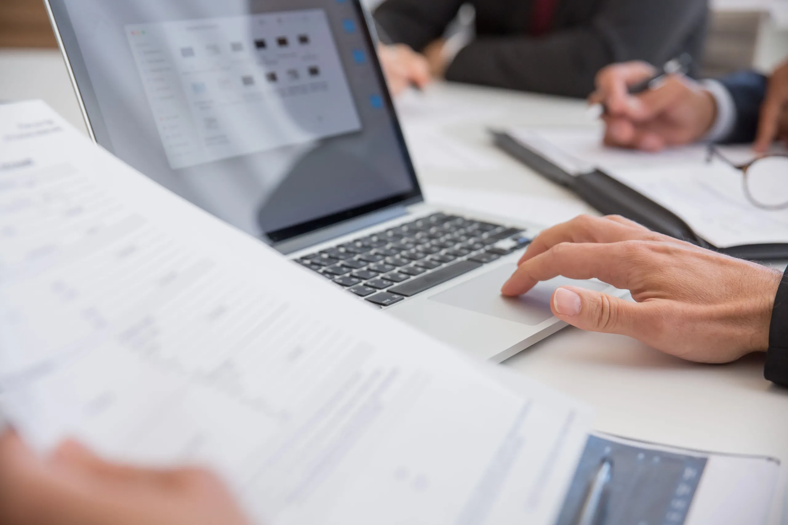 Private trustee reviewing financial documents during a bankruptcy case in Singapore