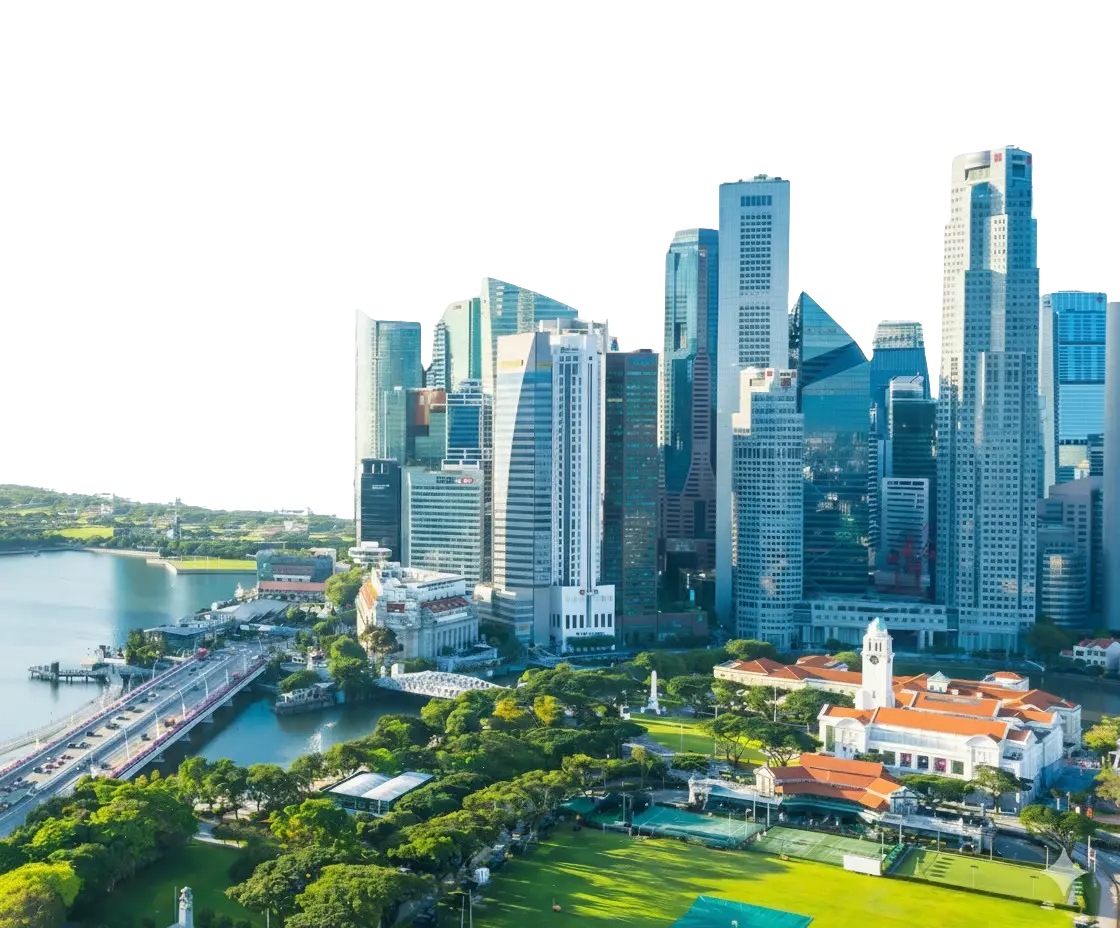 Aerial view of the Singapore central business district skyline featuring modern skyscrapers and lush greenery.